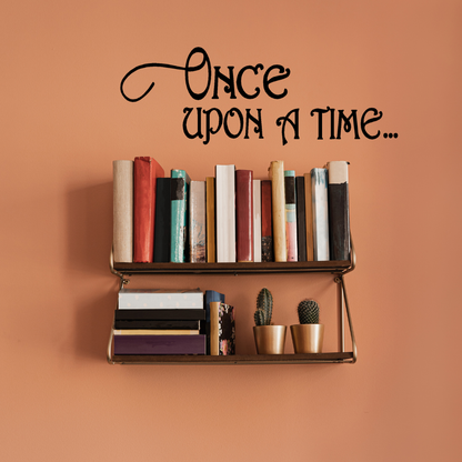 Children's bedroom with a bed, teddy bear, and decorative pillows, featuring a 'Once Upon a Time' wall decal. Two Little Giggles Wall Decal