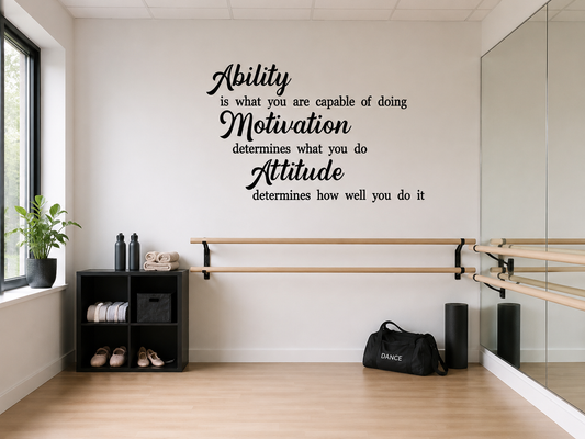 Black inspirational quote wall decal displayed in a modern office workspace with neutral styling, timber furniture and soft natural lighting.