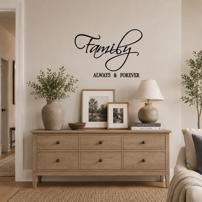 “Black Family Always & Forever removable wall decal styled in a casual hallway setting with a timber dresser, personal photo frames, candles, and natural home décor.”