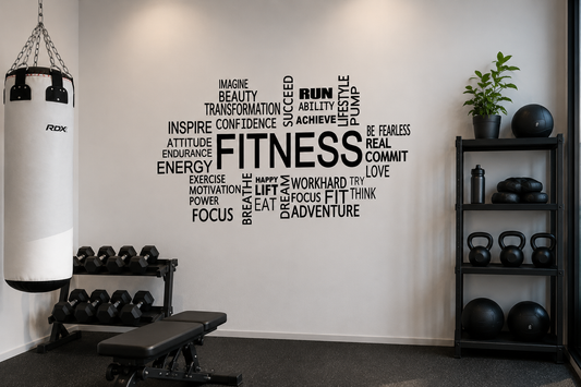 Black fitness motivation wall decal displayed in a modern home gym with weights, punching bag and neutral industrial styling.