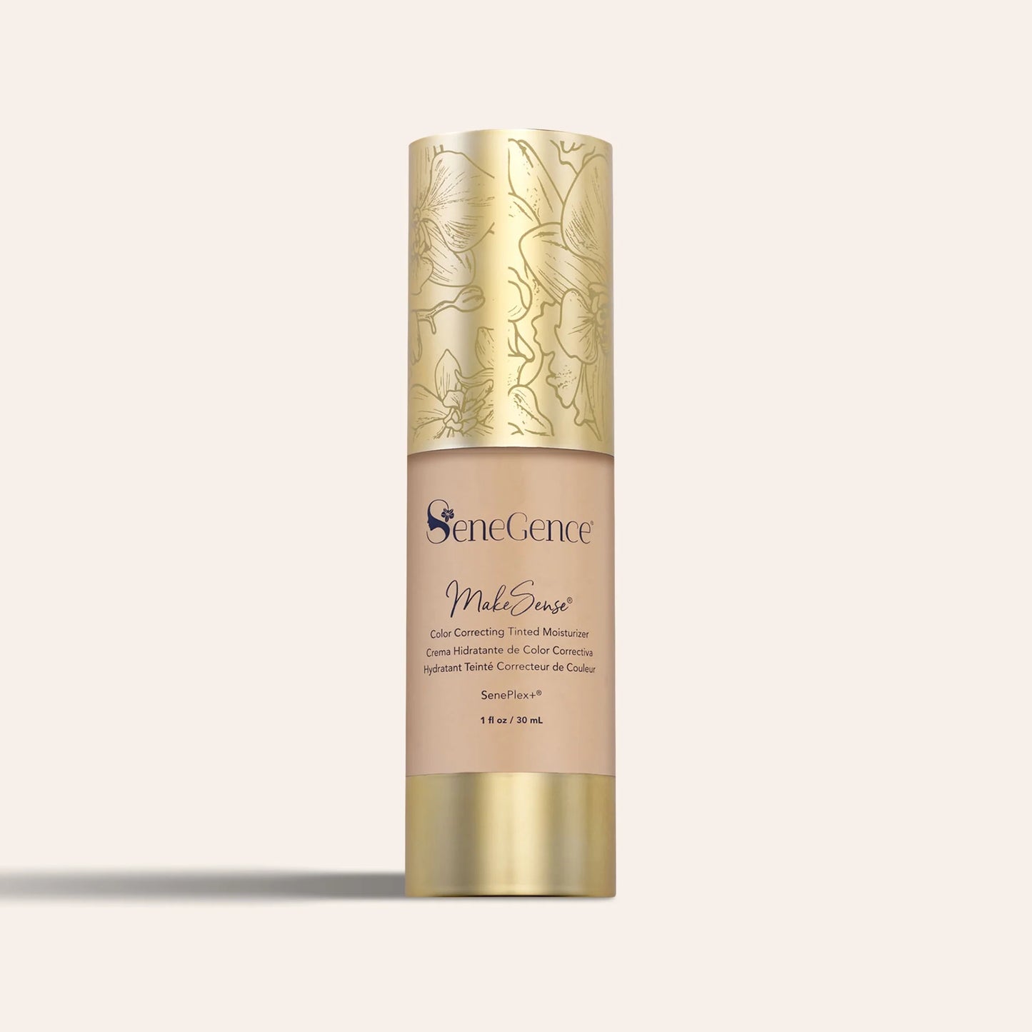 MakeSense Color Correcting Tinted Moisturizer in a beige bottle with a decorative gold floral cap