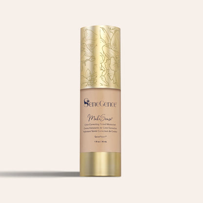 MakeSense Color Correcting Tinted Moisturizer in a beige bottle with a decorative gold floral cap