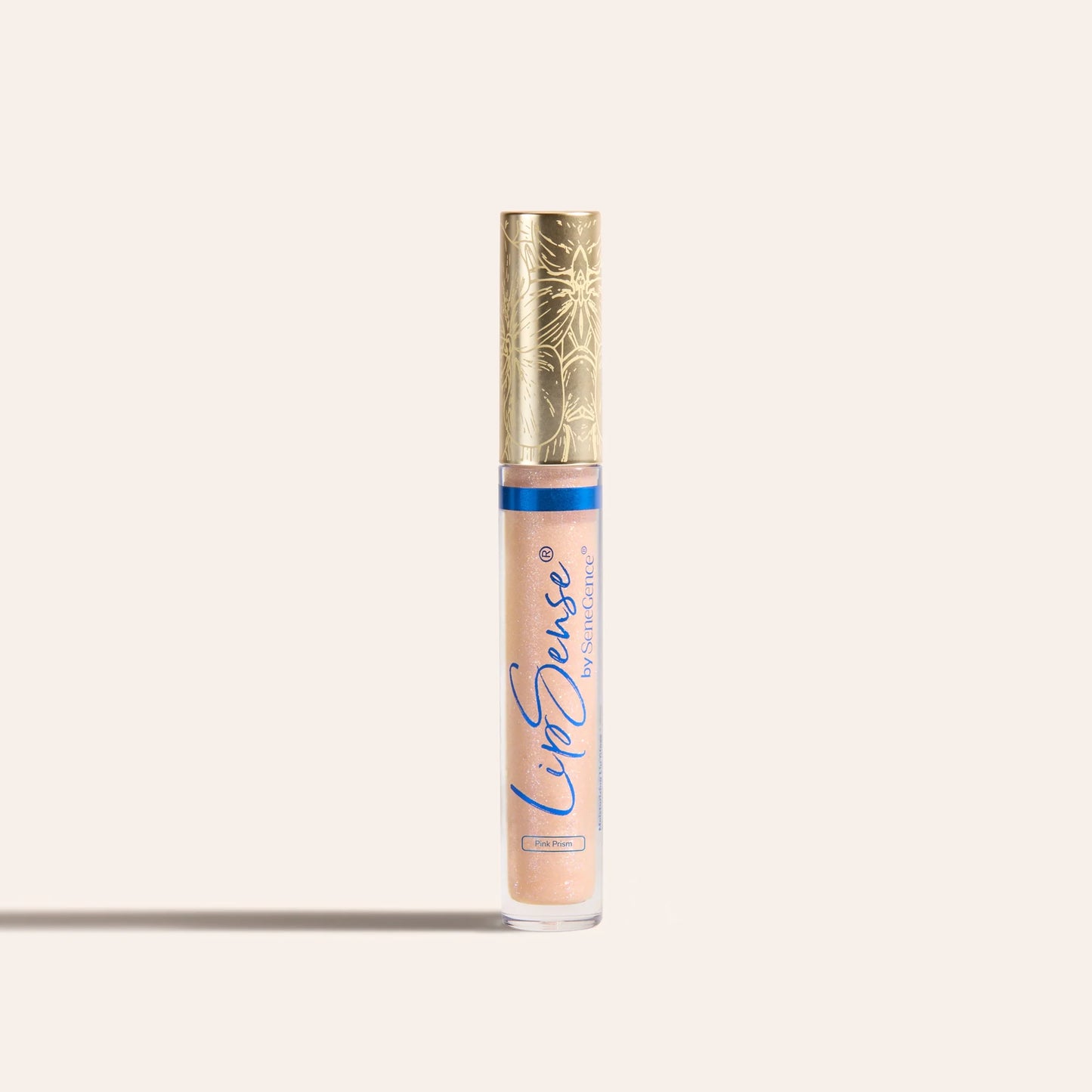 LipSense moisturizing gloss in peach pink shade in a clear tube with an ornate gold cap