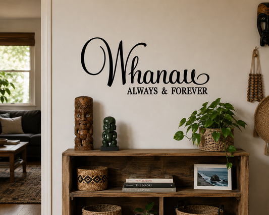 Living room with wooden shelf, decor items, and 'Whanau Always & Forever' wall decal.