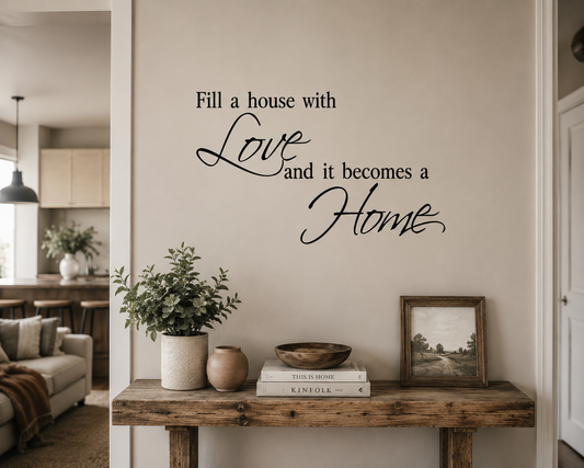 Wall with decorative quote 'Fill a house with love and it becomes a home' in a cozy living room.