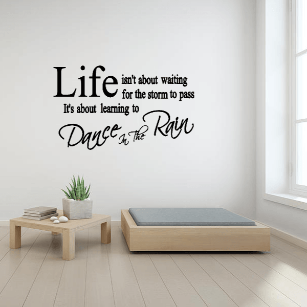 Dance in the Rain - Two Little Giggles Inspirational Dance in the Rain wall quote decal above neutral sofa in minimalist living room